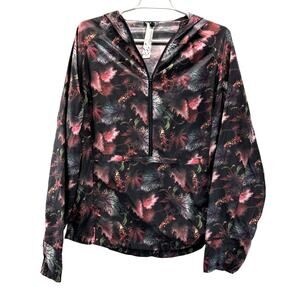 Oiselle Lightweight Pullover Jacket with a hood and a red/black leaf print Large